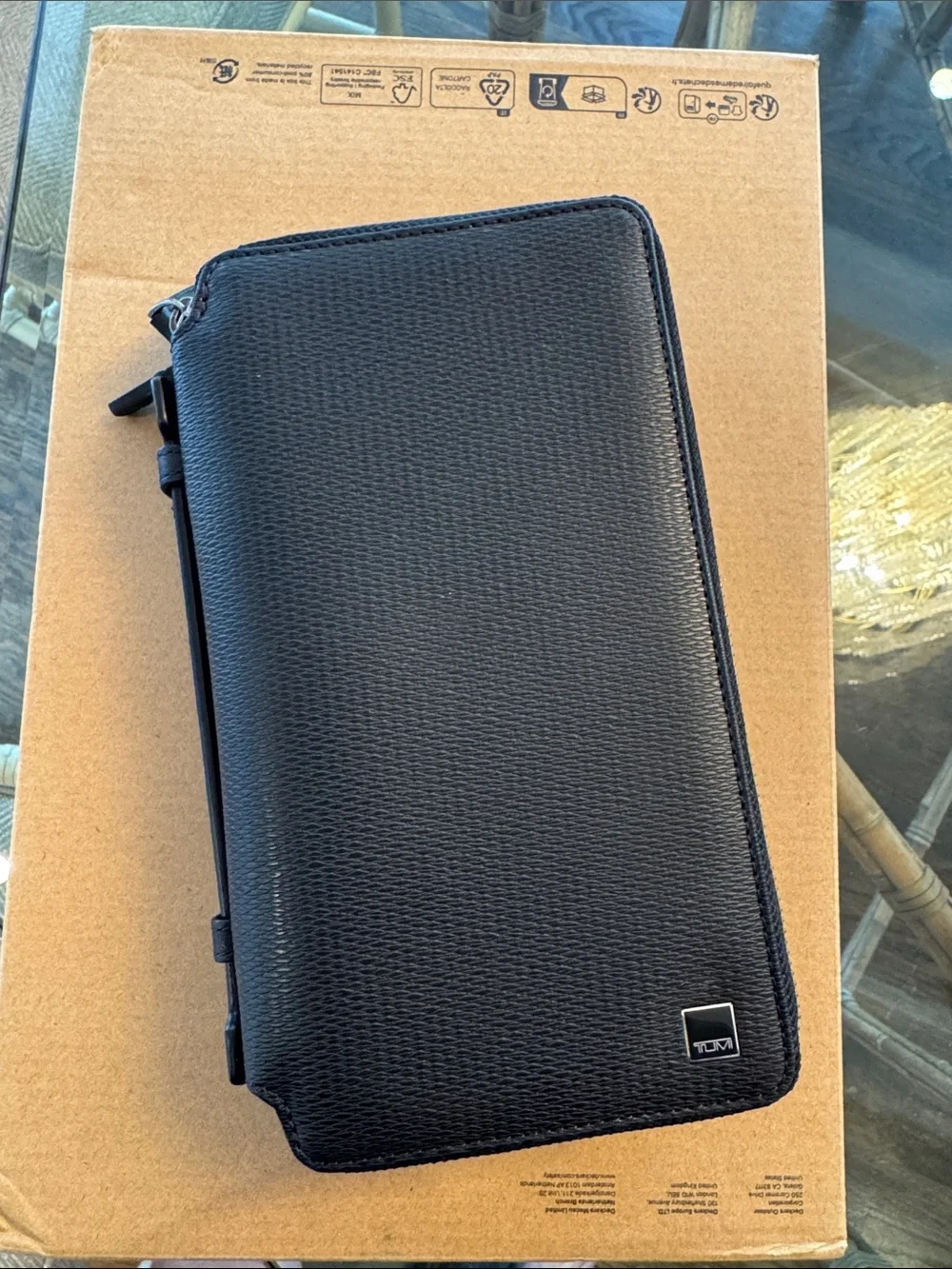 Tumi Black Textured executive double zip around clutch monaco